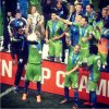 dempsey lifts trophy.JPG